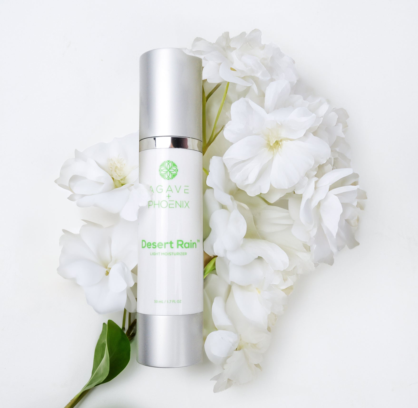 Desert Rain Moisturizer from Agave Phoenix, with a flowers—ready to be donated with care.